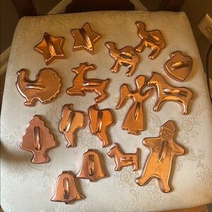 Vintage copper aluminum holiday cookie cutters, set of 16